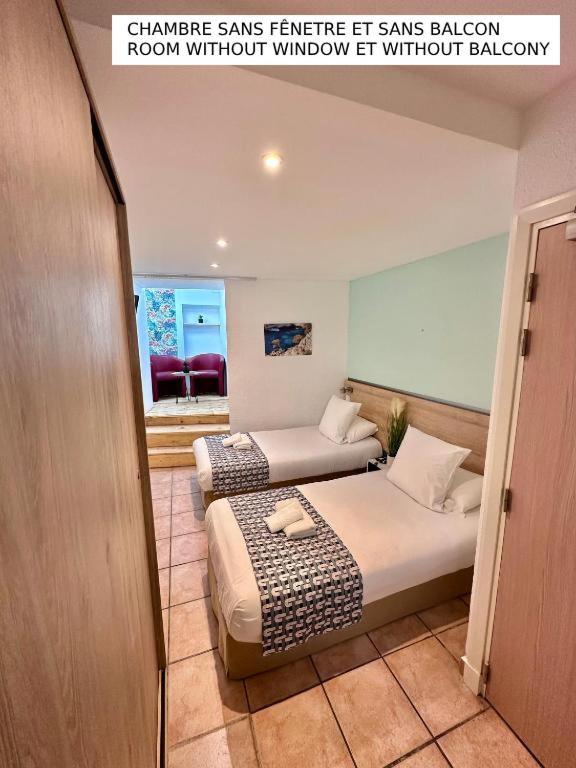 Standard Double or Twin Room with no balcony and no window,1591574631:JPEG