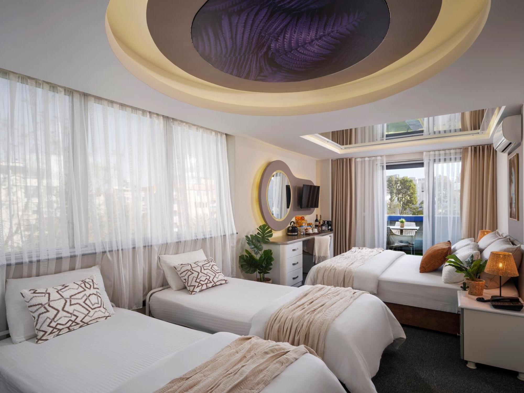 Deluxe Quadruple Room,1770037317:JPEG