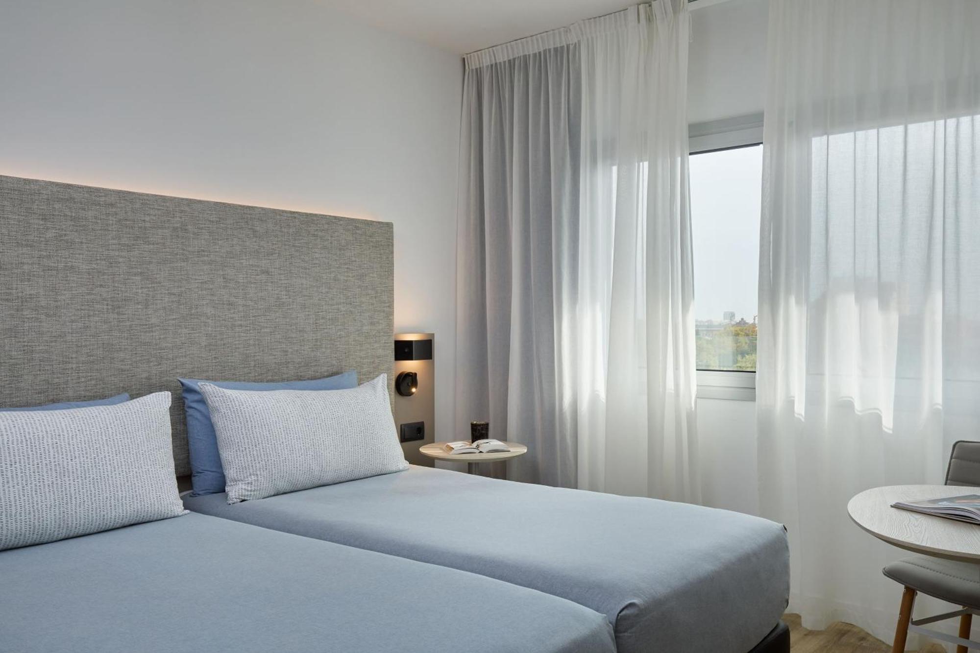 Quarto Comunicante The Studio com Vista Cidade