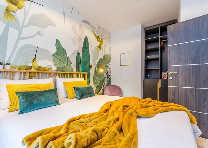 COLIBRI-Design&Beach Appartement mit 40m2 Terrasse und 2 SUPs