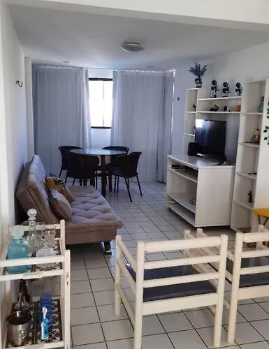 Apartamento azul no condomínio Mar de Cotovelo