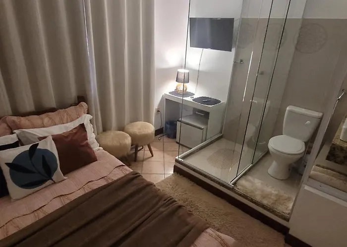 Banheiro de Vidro em Suíte compacta.Centro