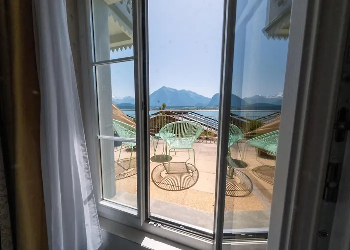 Haus Am See Lakefront Rooms On Lake Thun Self Check-In Digital Reception
