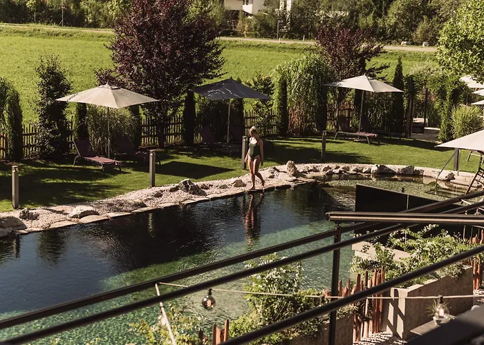 Wellness und Brunch Hotel MorgenZeit beheizter Naturteich Genuss Frühstück bis 13 Uhr Hochkönig Sommercard